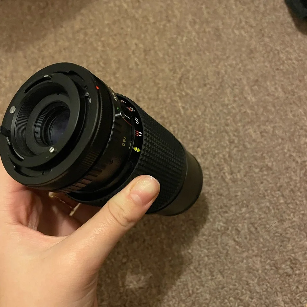auto rakunar camera lens with hoya 52mm lens